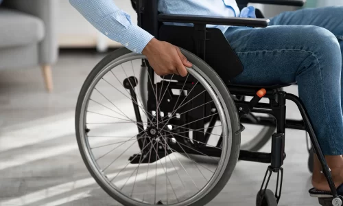 cropped-view-of-disabled-man-sitting-in-wheelchair